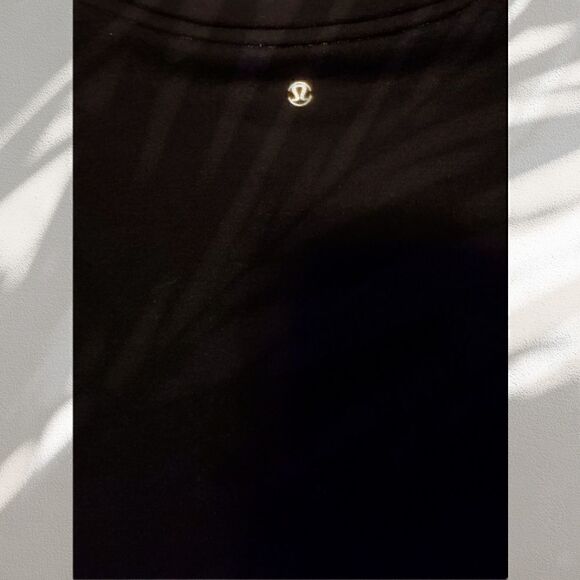 Size 4 Black Rare Lululemon Peplum Pullover - Picture 3 of 5